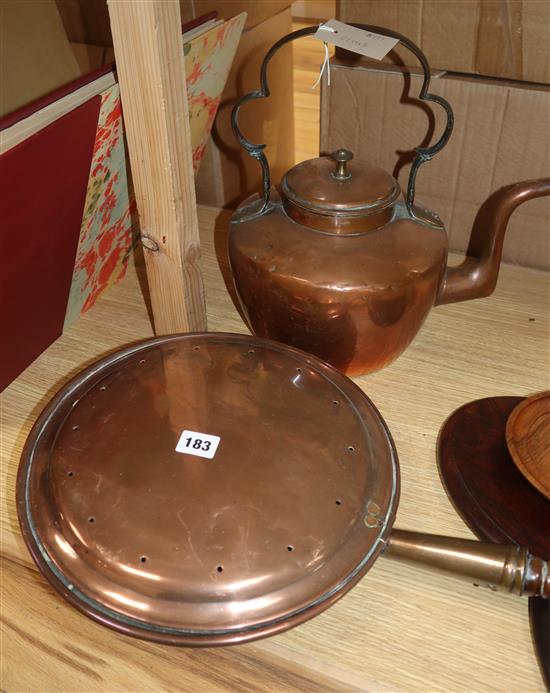 A copper kettle and a warming pan